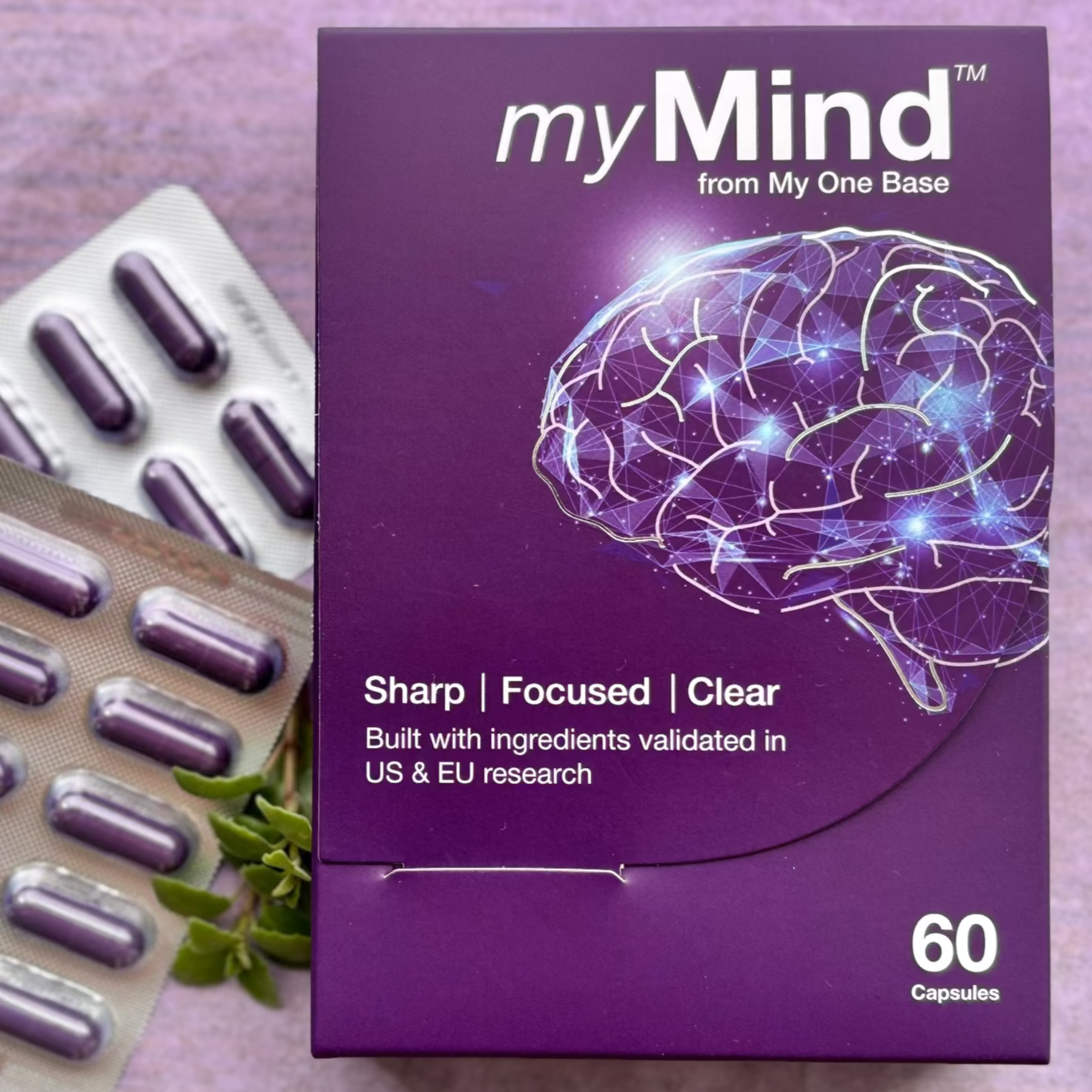 Purple packaging of 'myMind' with brain illustration and text on a purple background